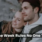 Couple sitting together and smiling, representing real and honest Valentine Week expectations.