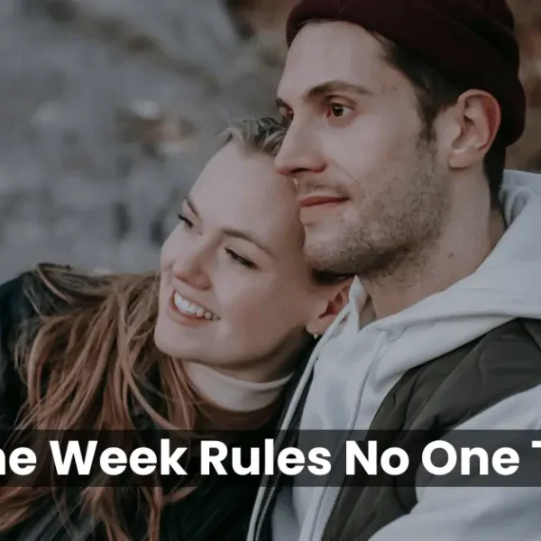 Couple sitting together and smiling, representing real and honest Valentine Week expectations.