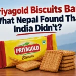 Priyagold biscuits packet with biscuits in front, with India and Nepal flags in the background.